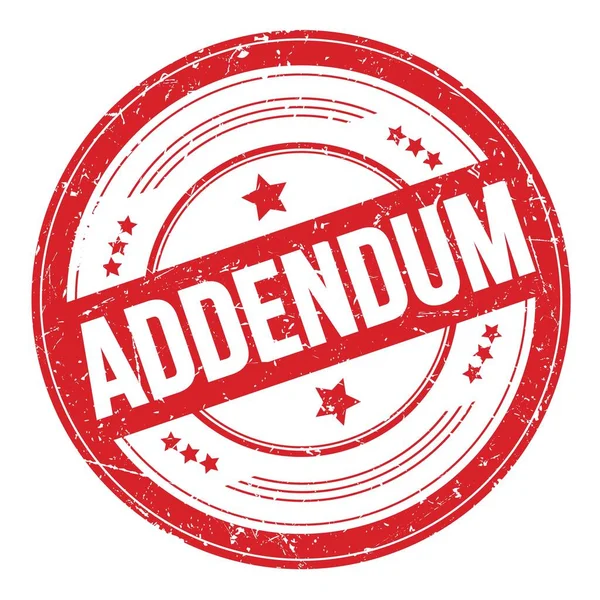 Kırmızı yuvarlak grungy desen damgalı ADDENDUM metni.