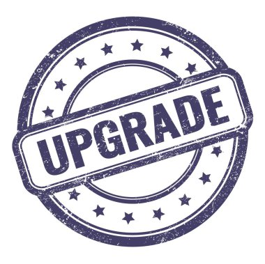 Çivit mavisi grungy vintage yuvarlak kauçuk damga üzerine UPGRAD metin.