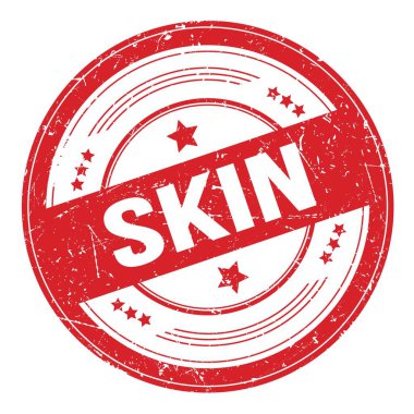 Kırmızı yuvarlak grungy doku damgası üzerine SKIN metin.