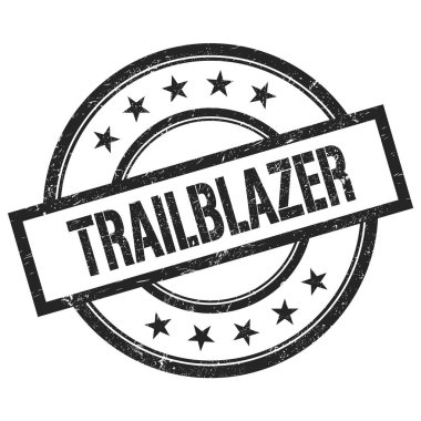 Siyah yuvarlak vintage kauçuk damga üzerine yazılmış TraILBLAZER metni.