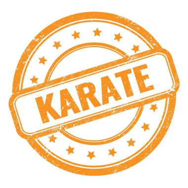 Turuncu grungy vintage yuvarlak kauçuk damgalı Karate metni.
