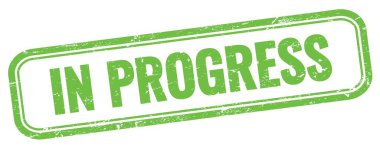 Yeşil grungy vintage dikdörtgen damgalı PROGRESS metni.