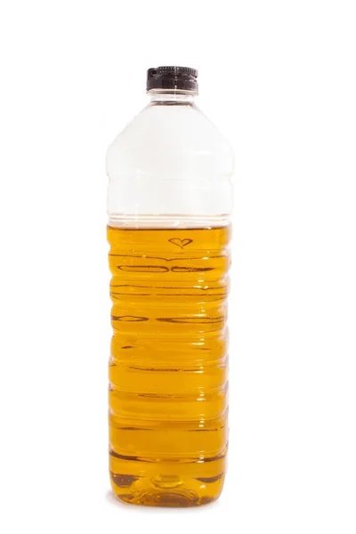 Olivenöl Einer Plastikflasche Isoliert Über Weiß lizenzfreie Stockfotos