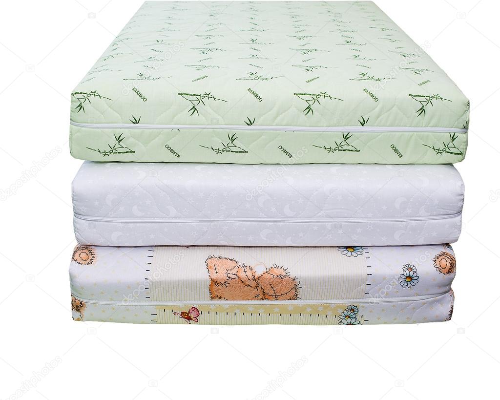 The mattresses on the bed