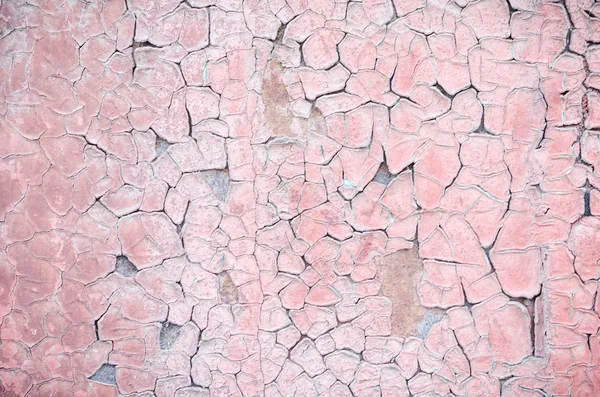 Copos de pintura vieja en una pared de hormigón —  Fotos de Stock