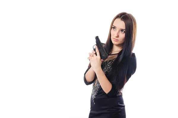 The girl with the gun in a black dress — Stock Photo, Image