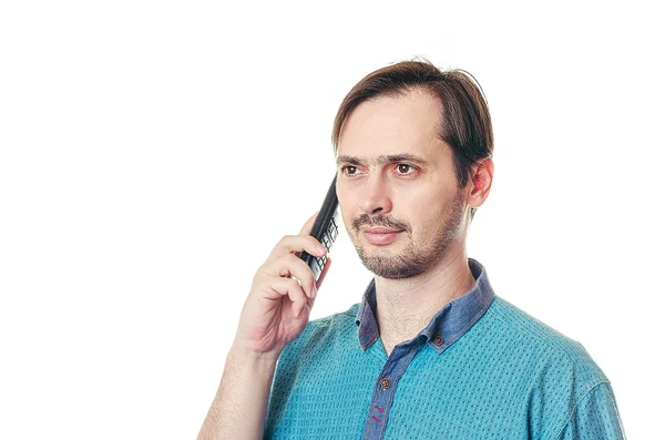 El hombre habla con una barba por teléfono fijo — Foto de Stock
