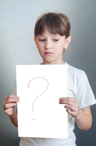 Girl holds hands clean sheet of paper — Stock Photo, Image