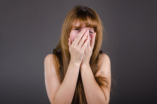 The woman in underwear laughs