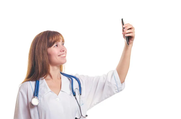 女性医師は携帯電話による撮影します。 — ストック写真