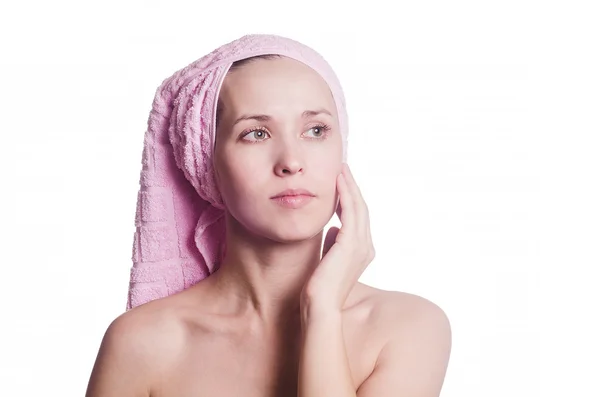 Die Frau mit einem Handtuch auf dem Kopf — Stockfoto