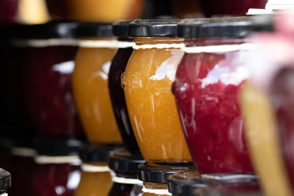 Close Portrait Rows Stacked Glass Pots Metal Black Lid Them — Stock Photo, Image