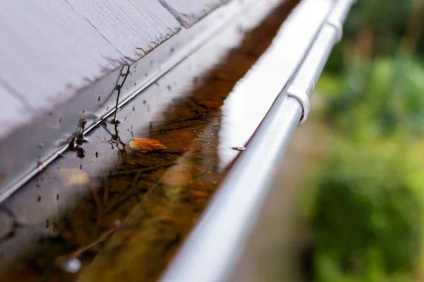 Close Portrait Clogged Roof Gutter Full Rain Water Rainy Cloudy — Stock Photo, Image