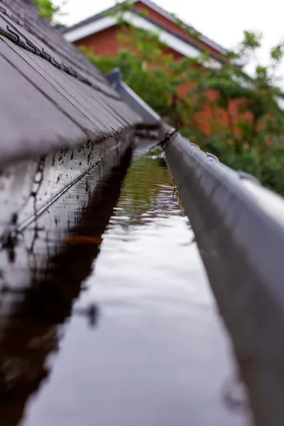 Portrait Clogged Roof Gutter Full Rain Water Rainy Cloudy Day — Stock Photo, Image
