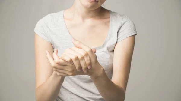 Parkinson\'s disease symptoms. Close up of tremor (shaking) hands of Middle-aged women patient with Parkinson\'s disease. Mental health and neurological disorders.