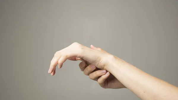 Parkinson\'s disease symptoms. Close up of tremor (shaking) hands of Middle-aged women patient with Parkinson\'s disease. Mental health and neurological disorders.