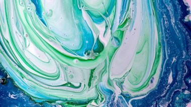 Sulu mürekkebin renkleri saydamdır. Soyut çok renkli mermer desen arkaplanı