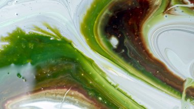 Sulu mürekkebin renkleri saydamdır. Soyut çok renkli mermer desen arkaplanı