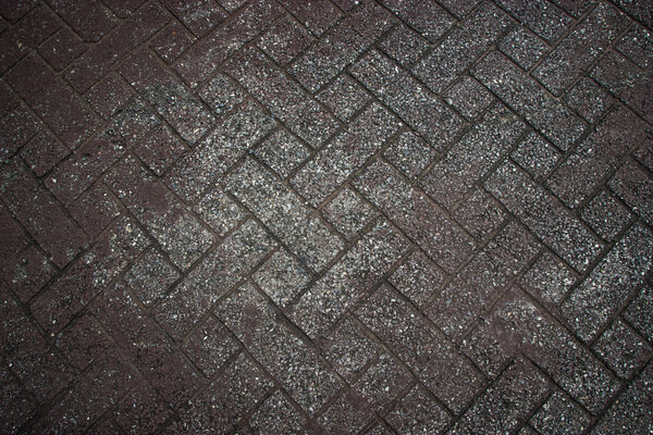 Sidewalk concrete texture. Background texture of gray tiled pavement city ground