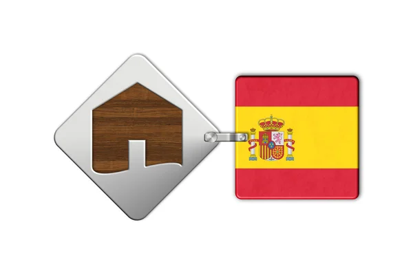 Home symbol made of steel and wood with Spain flag — Stock Photo, Image