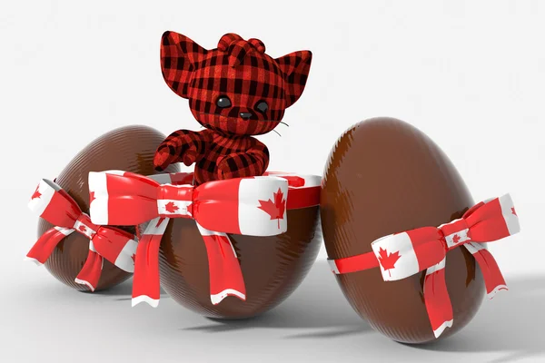 Easter egg chocolate with Canada colors and peluche — Stock Photo, Image