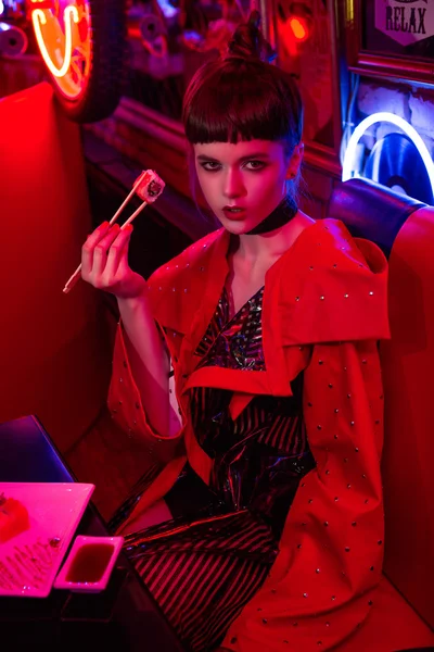 Girl in neon bar have fun