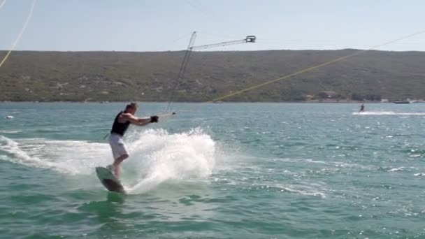 Wakeboarder Doing Flip Trick — Stock Video
