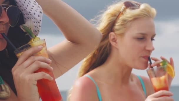 Girls on a yacht in sea with cocktails — Stock Video