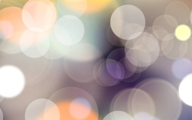 Soyut, parlak, pırıl pırıl çemberler, Noel ışıkları olan, altın renginde, şenlikli, şenlikli bir arka plan. Güzel doku.