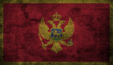 Dalgalı grunge dokusuyla Karadağ bayrağı. Vektör arkaplanı.