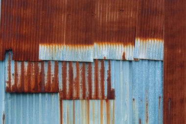 Paslanmış galvanize demir plaka.