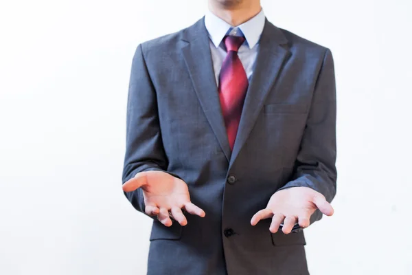 비즈니스 남자 양복 보여주는 혼란 고립 된 흰색 배경에 로그인 — 스톡 사진