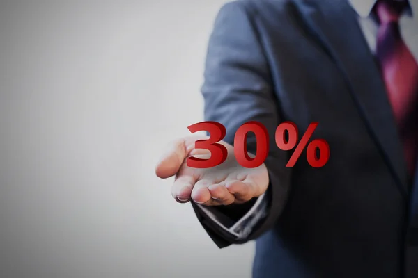 Empresário apresentando 30 por cento gráfico na mão — Fotografia de Stock