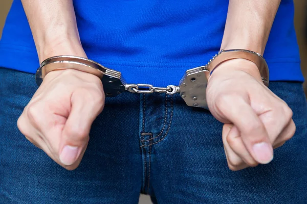 Handcuffed hands Closeup shot — Stock Photo, Image