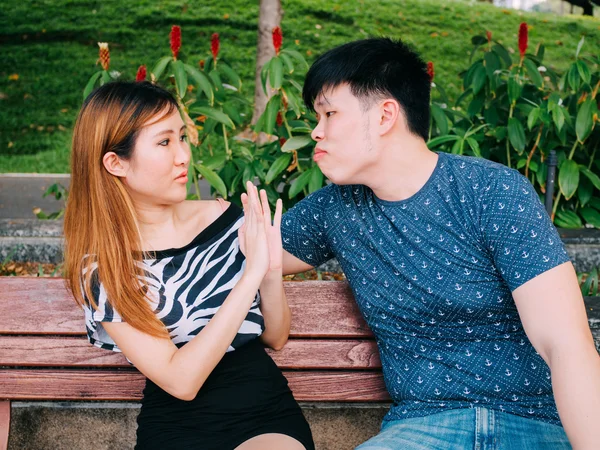 Young Asian man trying to kiss a girl and gets rejected — Stock Photo, Image