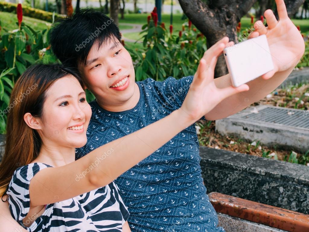 Couple asian outdoor watching