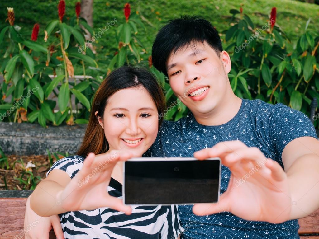 Young outdoor couple asian