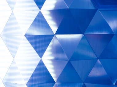 Mavi düşük Poli geometrik arka plan aydınlatma sol ile
