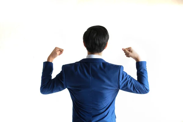 Espalda del hombre de negocios flexionando o mostrando bíceps - lo que indica una actitud fuerte y segura - con espacio para copiar — Foto de Stock