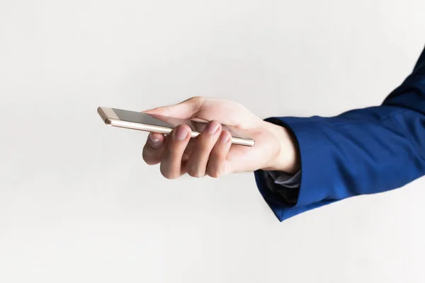 Business man using a cellphone (focus on phone) with copy space — Stock Photo, Image