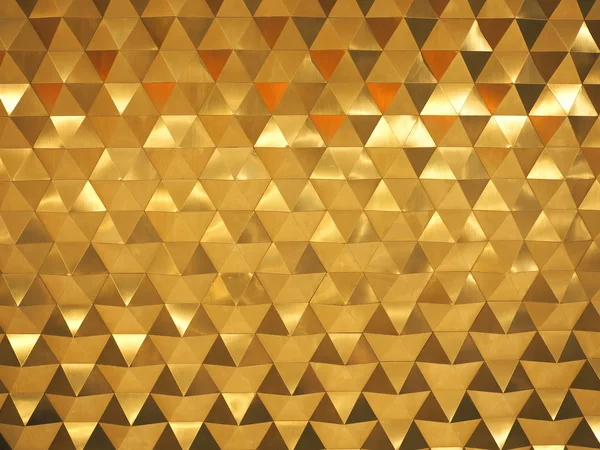 Zlaté žluté nízké poly geometrická abstraktní pozadí v pomačkaném trojúhelníkové stylu — Stock fotografie