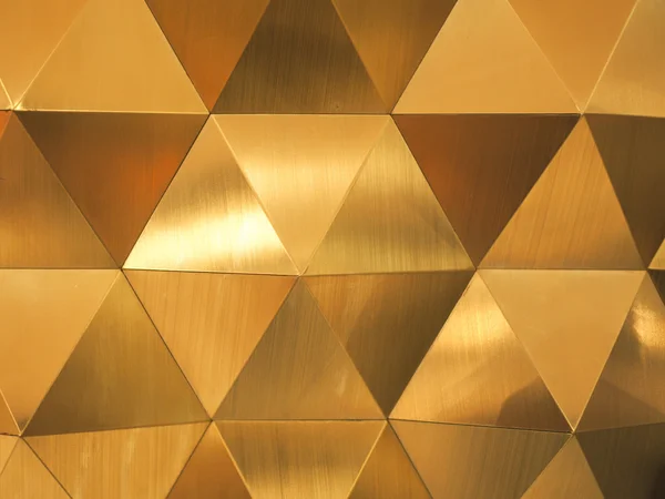 Amarelo dourado baixo poli fundo abstrato geométrico em estilo triangular enrugado — Fotografia de Stock