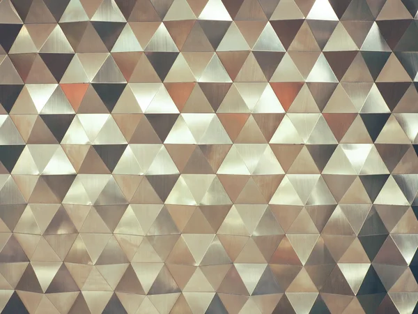 Fondo abstracto geométrico polivinílico bajo plateado en estilo triangular arrugado — Foto de Stock
