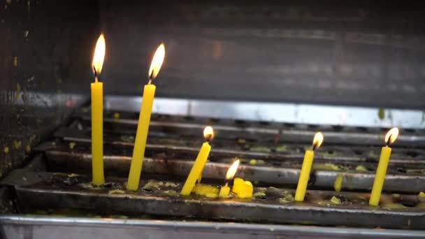 Burning candle light in front of Asian temple - Faith, spirituality and religion — Video Stock