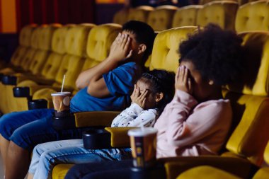 Children watching scary movie