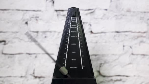 Antique metronome with pendulum in slow motion — Stock Video