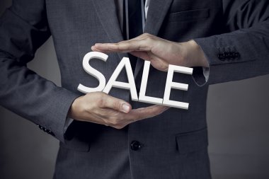 'Satış' işadamı avucunda kelime