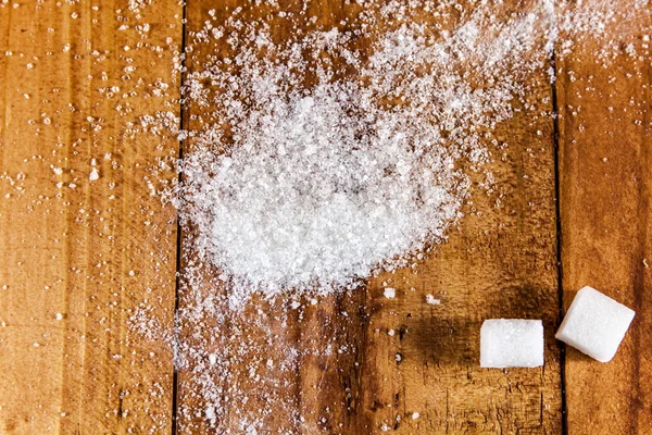 Granulated White Sugar Spill over Wooden Background — Stock Photo, Image