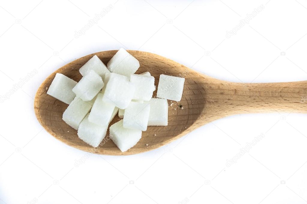 Aerial View of Sugar Cubes on Spoon on Isolated White Background