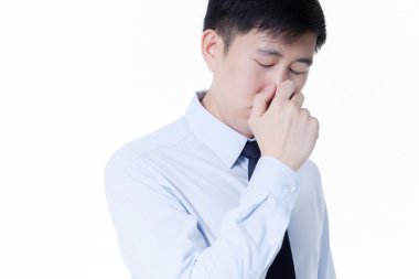 Burun akıntısı acı genç Asya iş / grip / grip